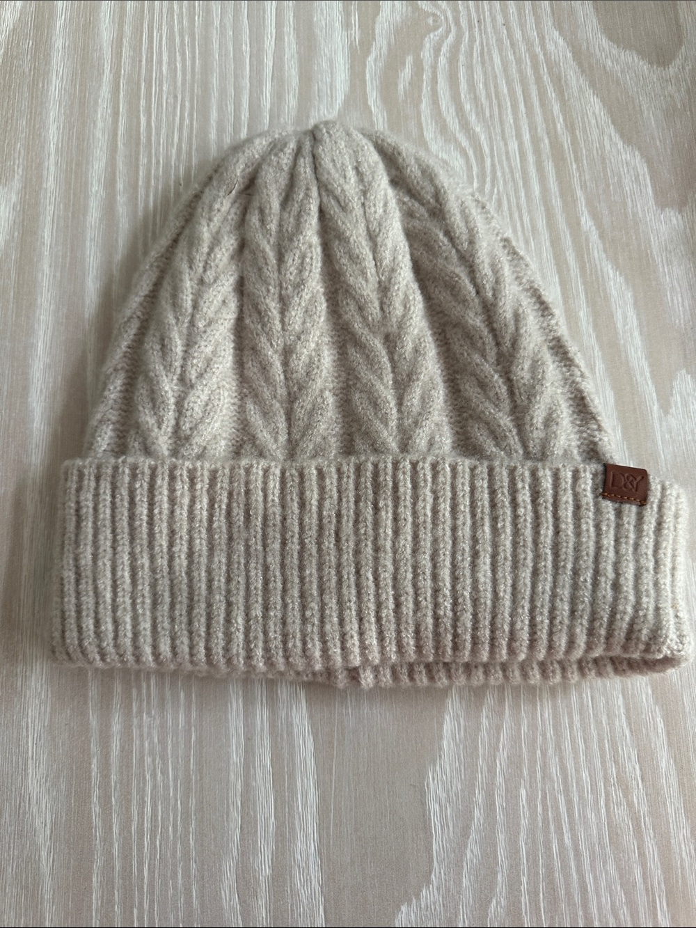 D&Y Cream Cable Knit Beanie with Brown Leather Logo